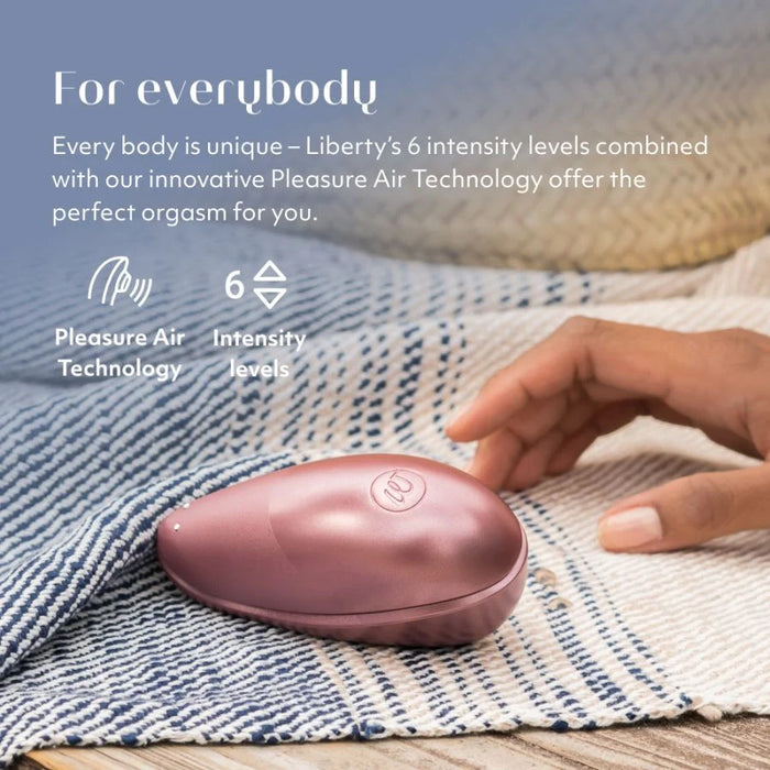 Womanizer Liberty Clitoral Stimulator in Pink Rose